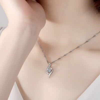 A Heartfelt Promise: The Clavicle Pendant with Loving Note